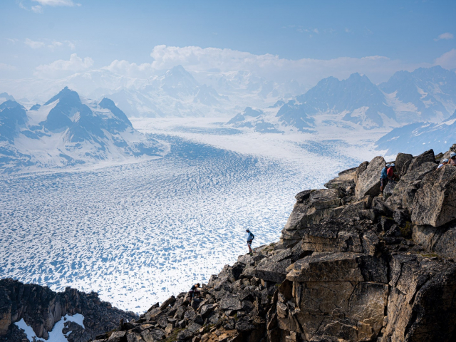 man climbing alaskas via ferrata in the tordrillo mountains