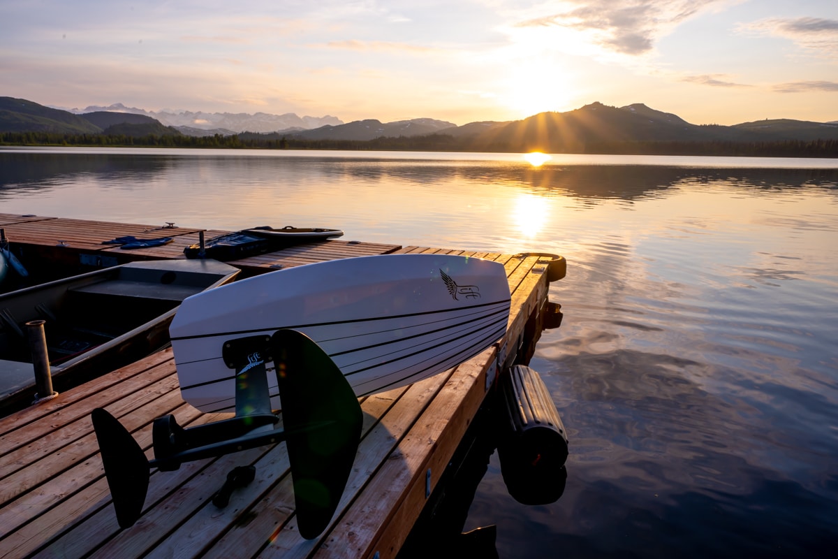 an electric foil board sitting on a dock at tordrillo mountain lodge