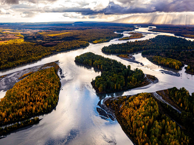 flying over the susitna river during the fall