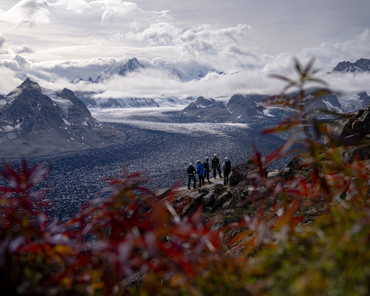 a group climbs the via ferrata in the tordrillo mountains