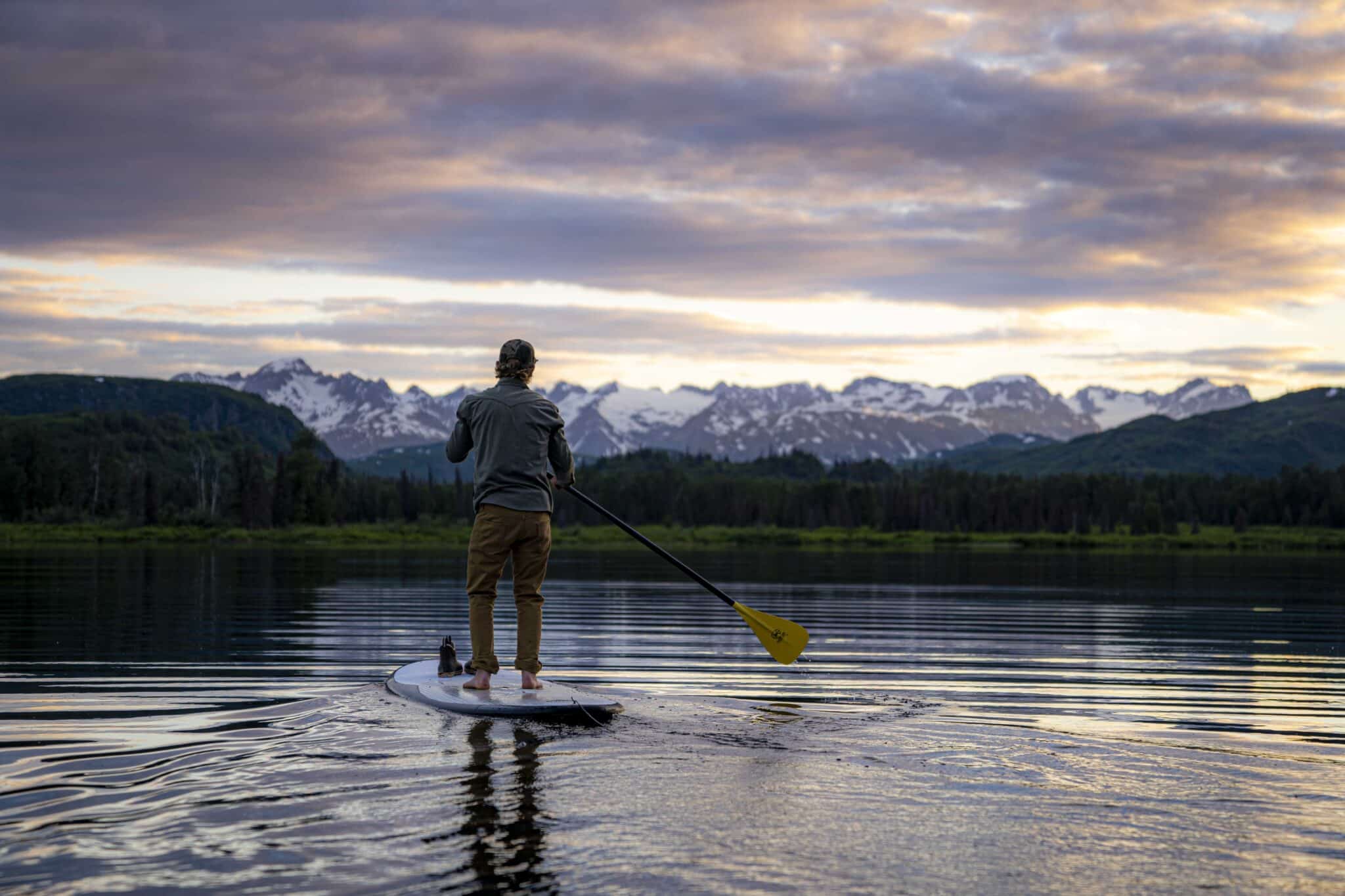 paddleboarding on judd lake as the sun sets