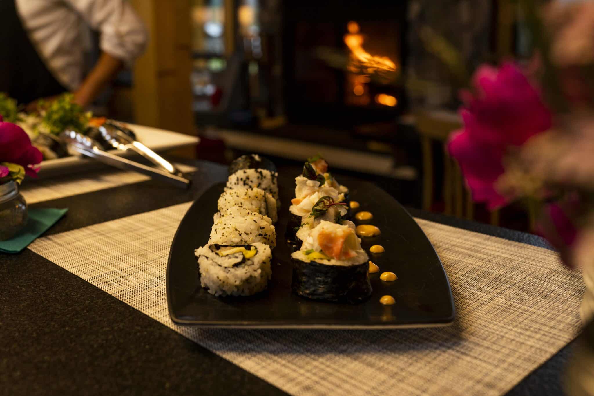 sushi plated in front of the fire